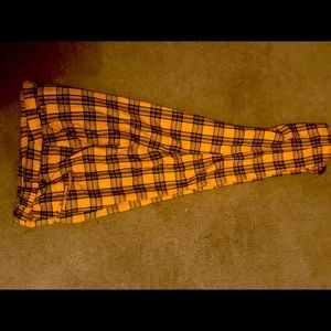 Mustard yellow Large , tight around the thighs